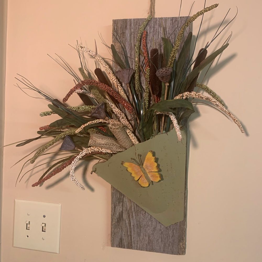 Fall arrangement in green tin on board.  Inv 199